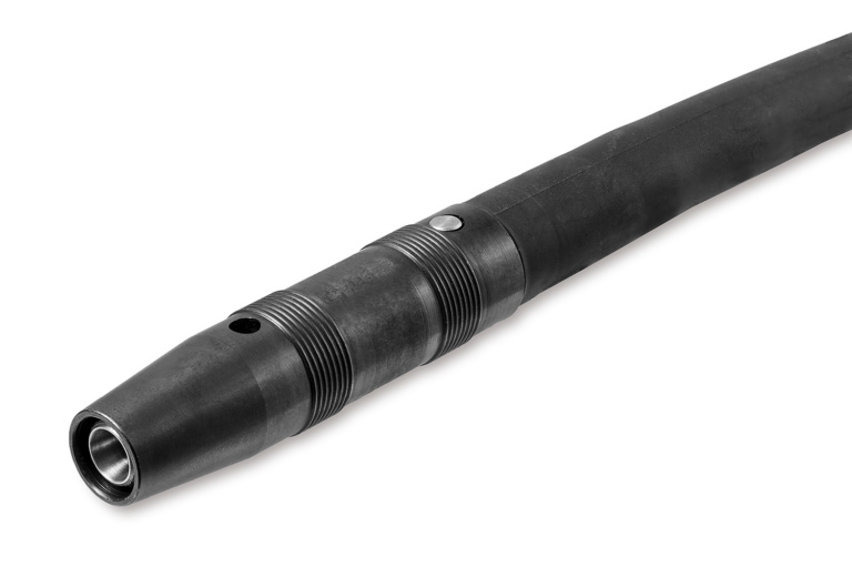 Close-up of a black hose connected to a metal coupling with machined grooves and a conical nozzle end.